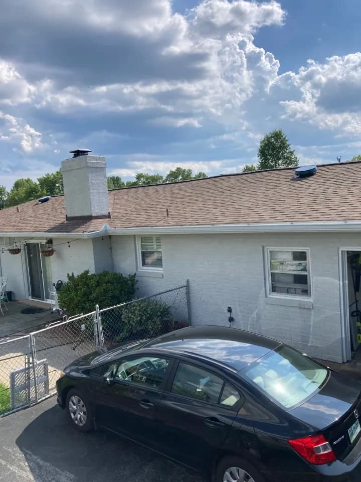 Two solar attic vents installed on a roof in Hendersonville, Tennessee