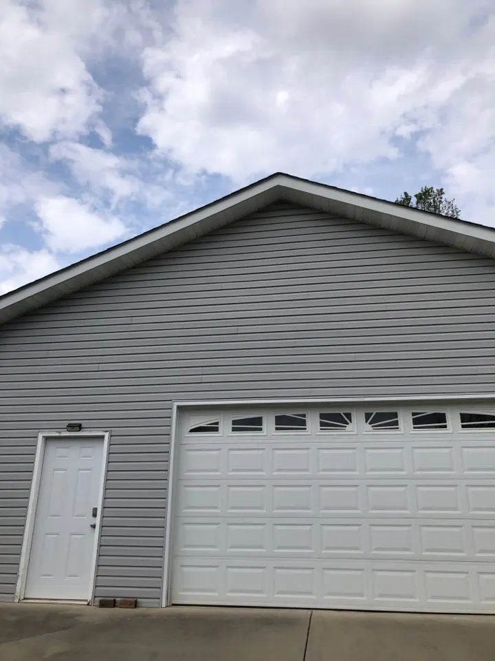 Home in Clinton job photo: answering questions about vinyl siding installation