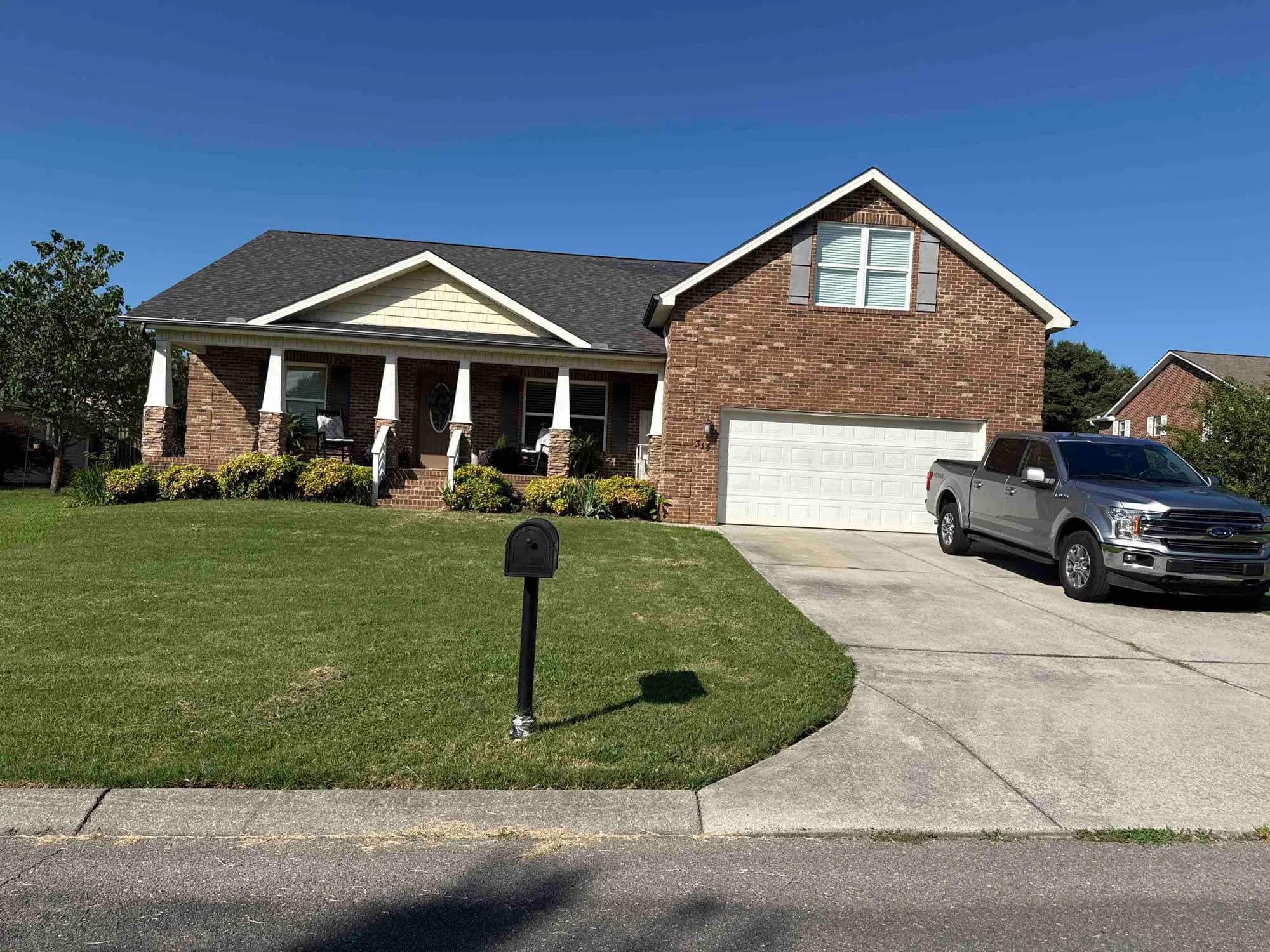 Damaged ridge vent being replaced to repair a roof leak on a home in Maryville