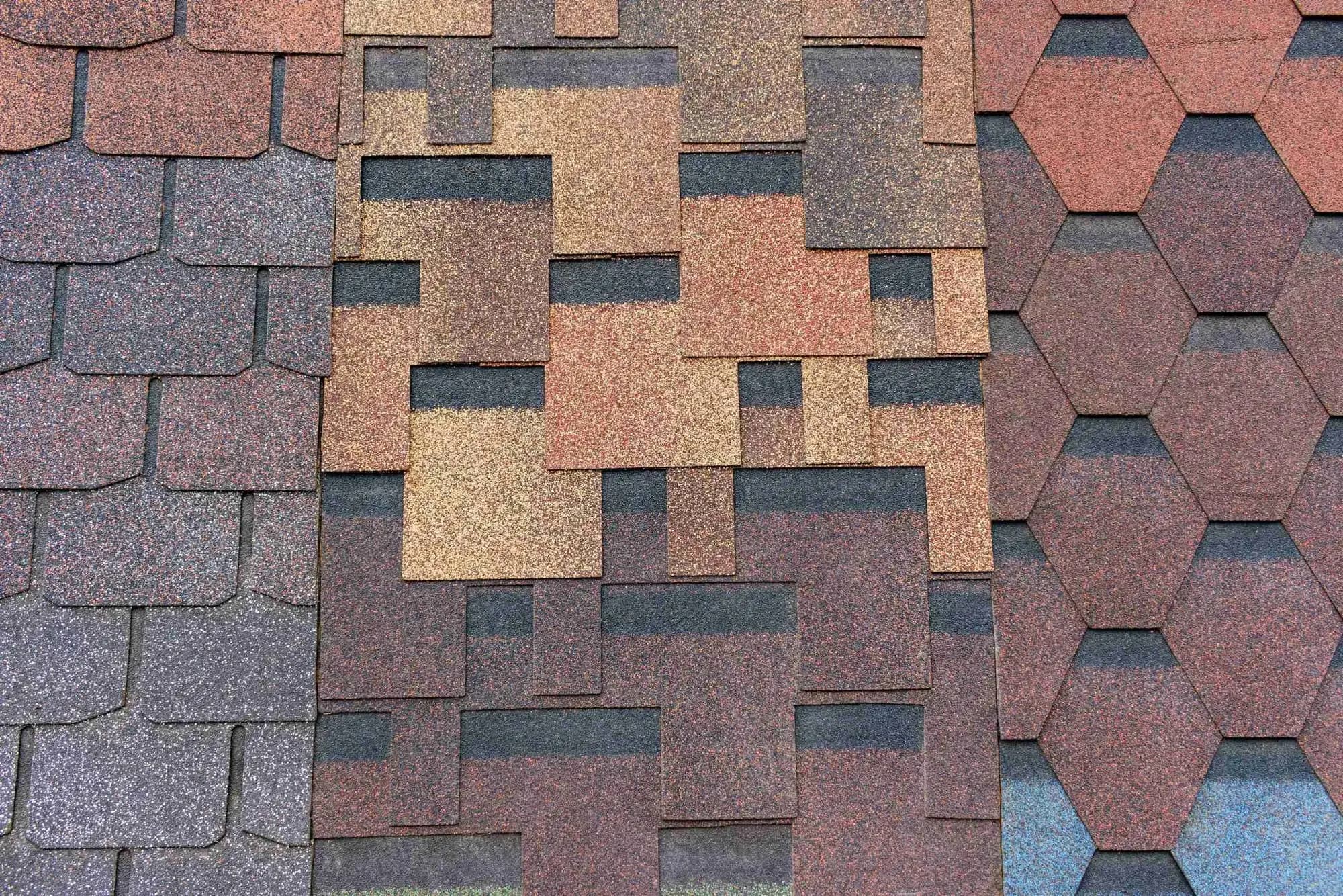 Close view of multicolored asphalt shingle samples