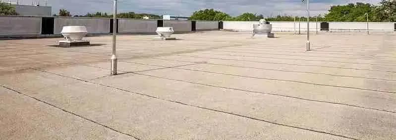 Flat commercial roof with rooftop vents