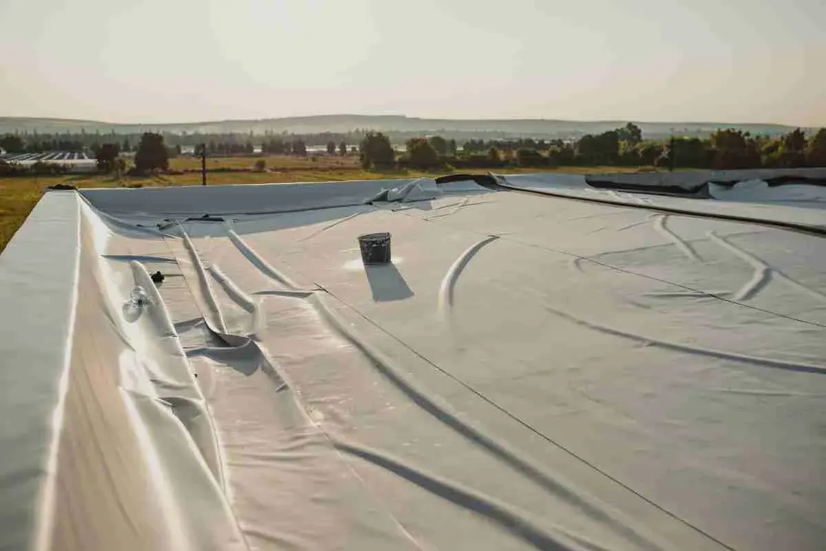Gray single-ply membrane on a low-slope commercial roof