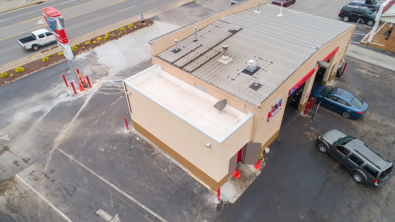 Aerial view of a Valvoline oil change store and its roof