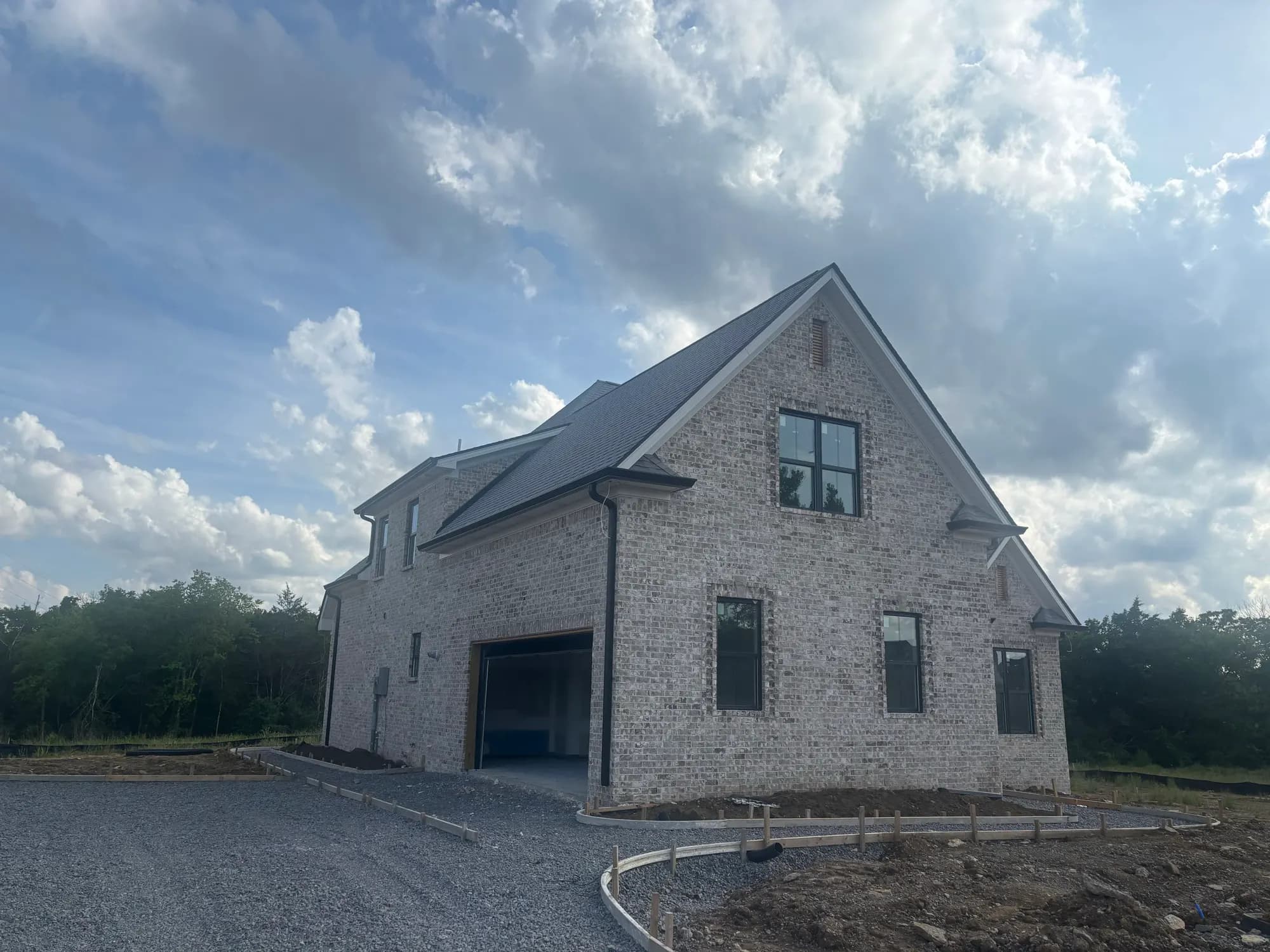 Two-story home with a new gray shingle roof, from our Lebanon office's job photos