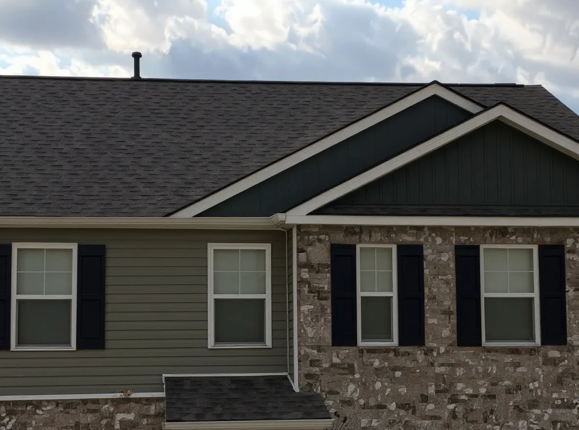 Roof of a home in Loudon, job photo: replacing some storm damaged shingles