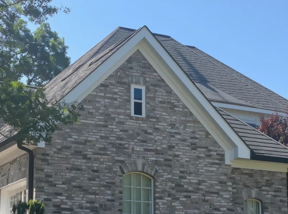 Roof of a home in Kingston, job photo: replacing storm damaged shingles