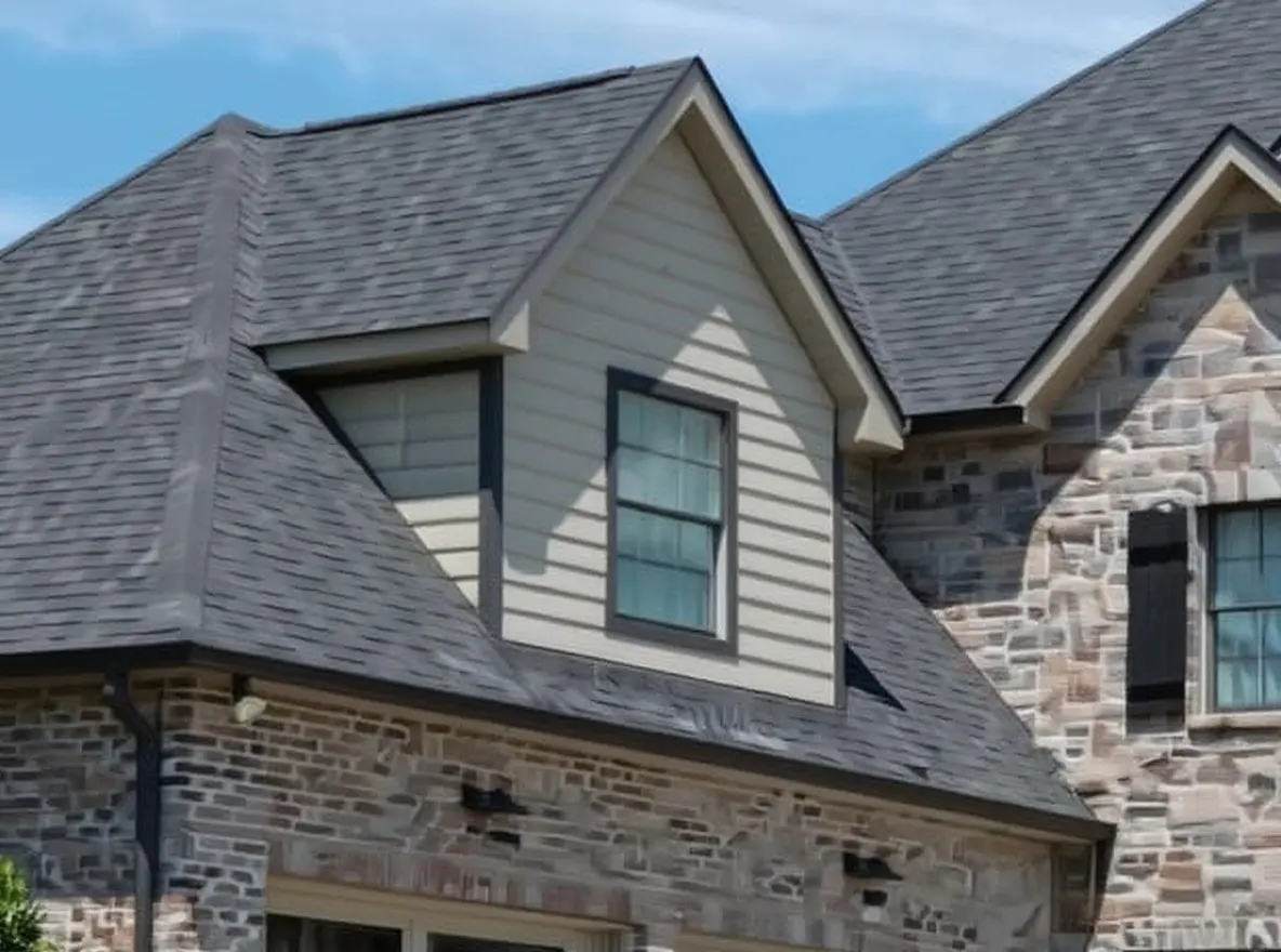 Roof of a home in Farragut, job photo: replacing damaged flashing on this roof. Installing shingles to repair a roof leak in the valley of the roof