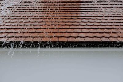 Water running off a freshly repaired tile roof in Nashville