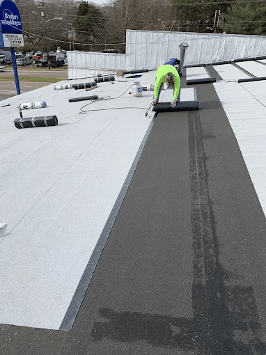 A commercial building re-roof - Doing the job right, Mobley Brothers Roofing and Renovation LLC always does a complete tear-off before replacing your Nashville commercial roof.